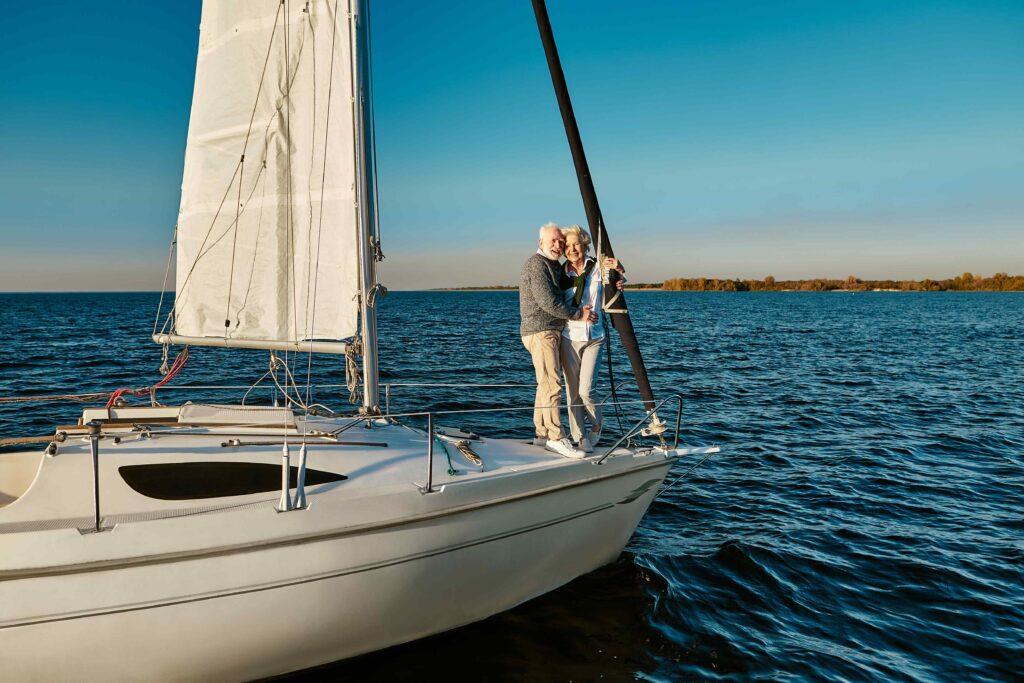 Two seniors on a sailboat