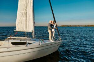 Two seniors on a sailboat